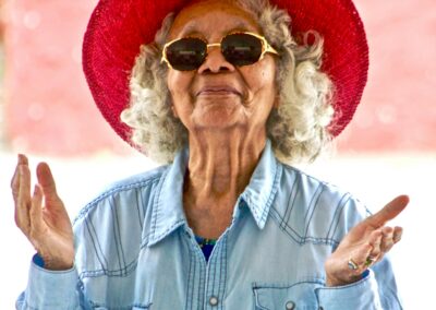 elderly person with open hands